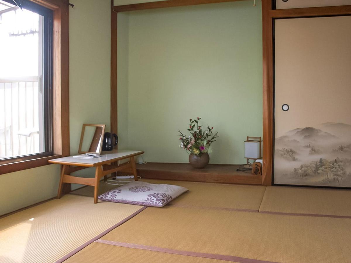 فندق Guest Cafe Kuchikumano Kamitondacho المظهر الخارجي الصورة