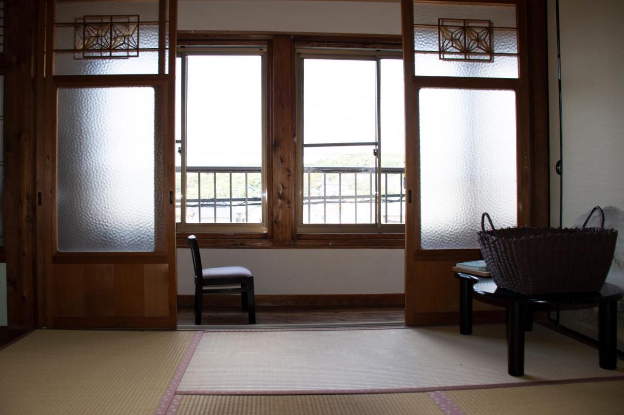 فندق Guest Cafe Kuchikumano Kamitondacho المظهر الخارجي الصورة